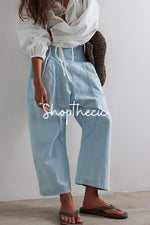 Washed drop-crotch mid-rise straight-leg harem cropped jeans