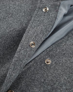 Grauer übergroßer Wollmantel mit Stehkragen