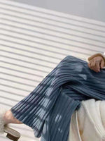 High-waisted draped pitted straight-leg loose knit trousers