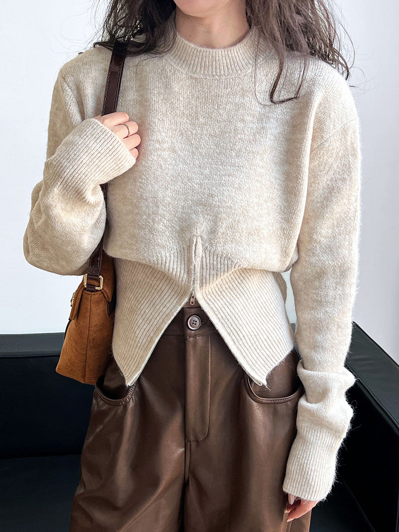Pull zippé à col rond et taille cintrée