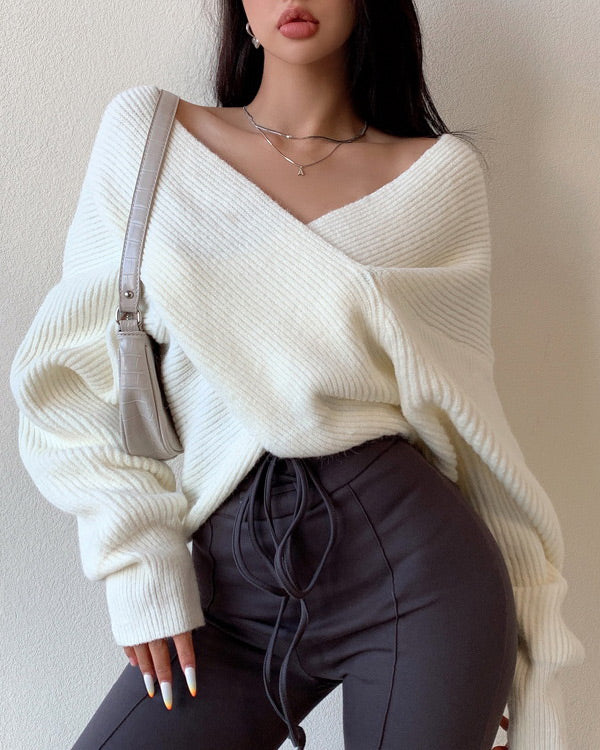 Off-the-shoulder cross-over asymmetrical cropped sweater