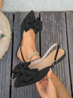 Large bow pointed toe flat heel sandals