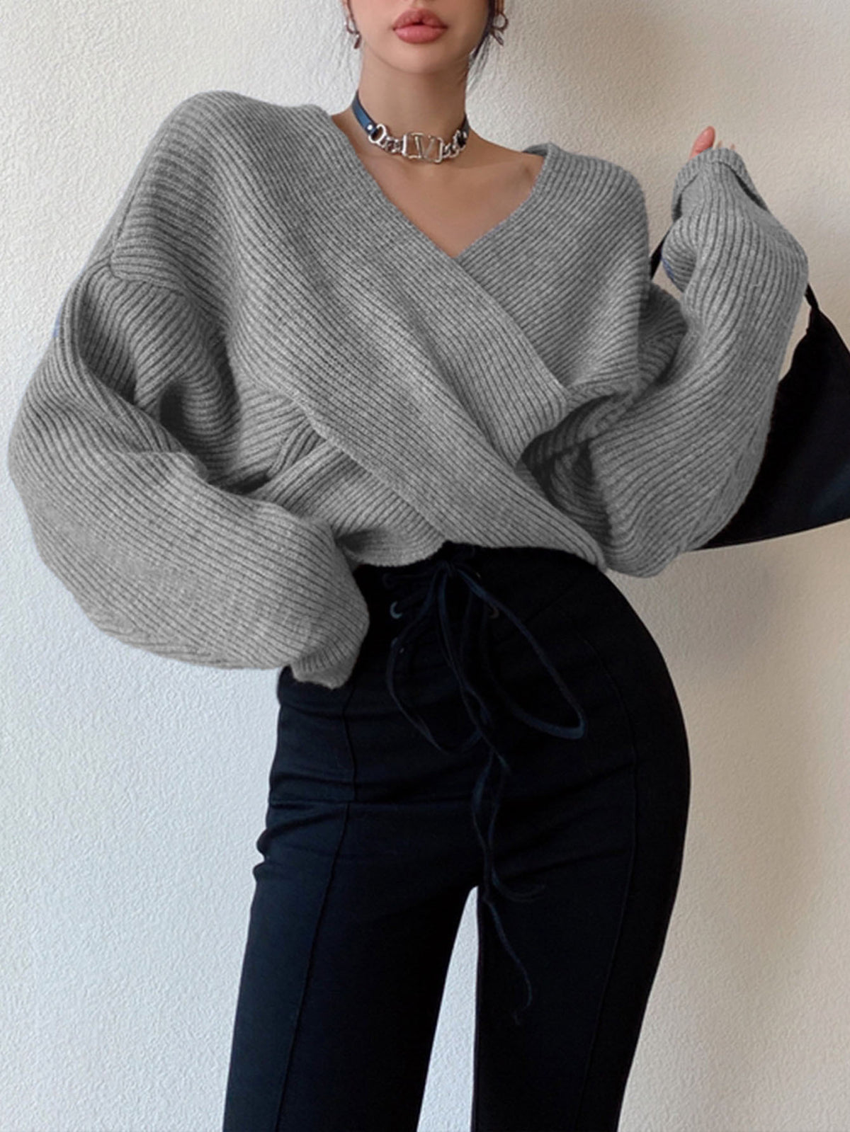 Off-the-shoulder cross-over asymmetrical cropped sweater