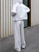 Zippered hooded sweatshirt and lace-up trousers two-piece set