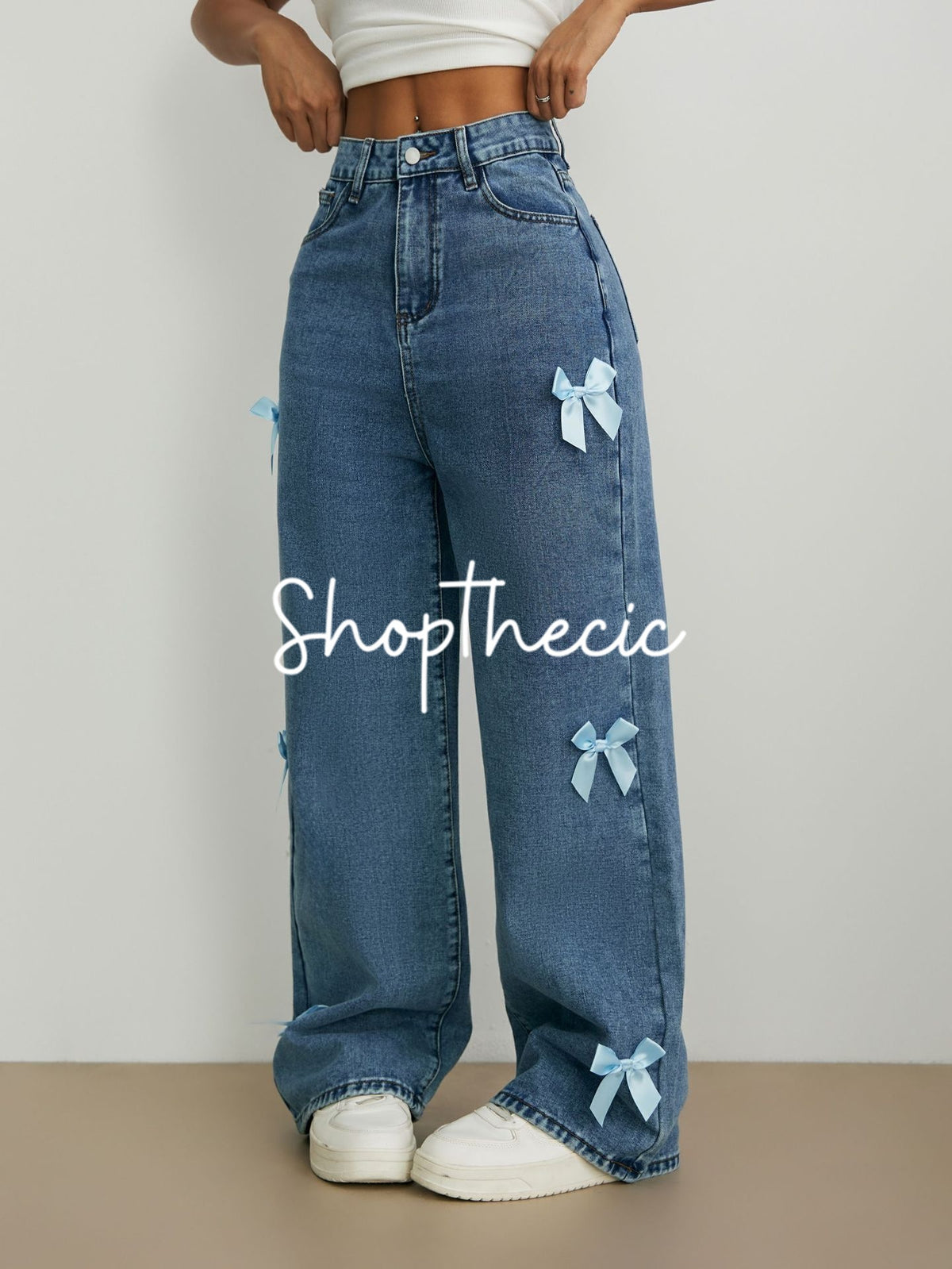 Bow-tie straight wide-leg washed jeans