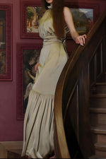 Champagne satin sleeveless high-neck open-back slim dress