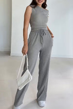 Ensemble deux pièces haut sans manches à col incliné et pantalon droit ample