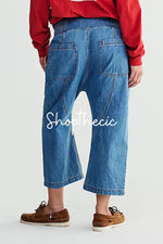 Washed drop-crotch mid-rise straight-leg harem cropped jeans