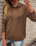 Pull à capuche en jacquard à manches longues et lacets