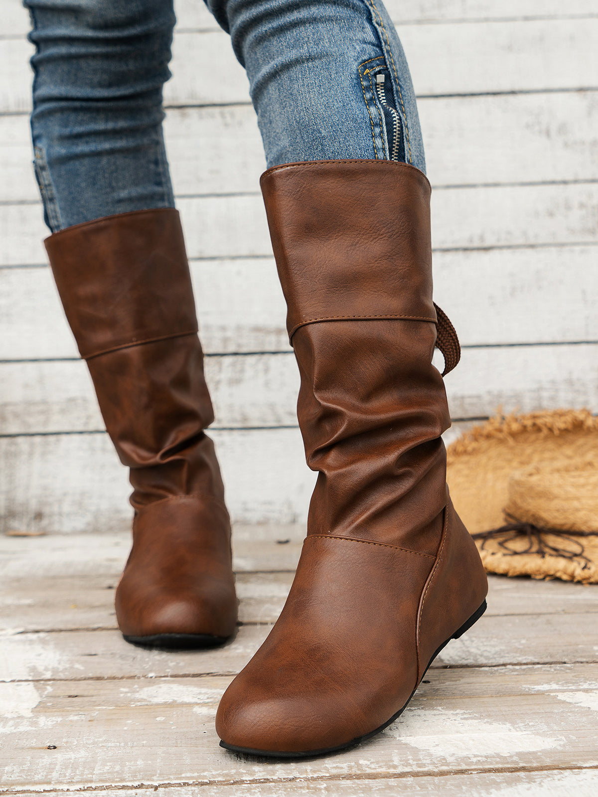 Bottines mi-mollet à bout rond et nœud arrière