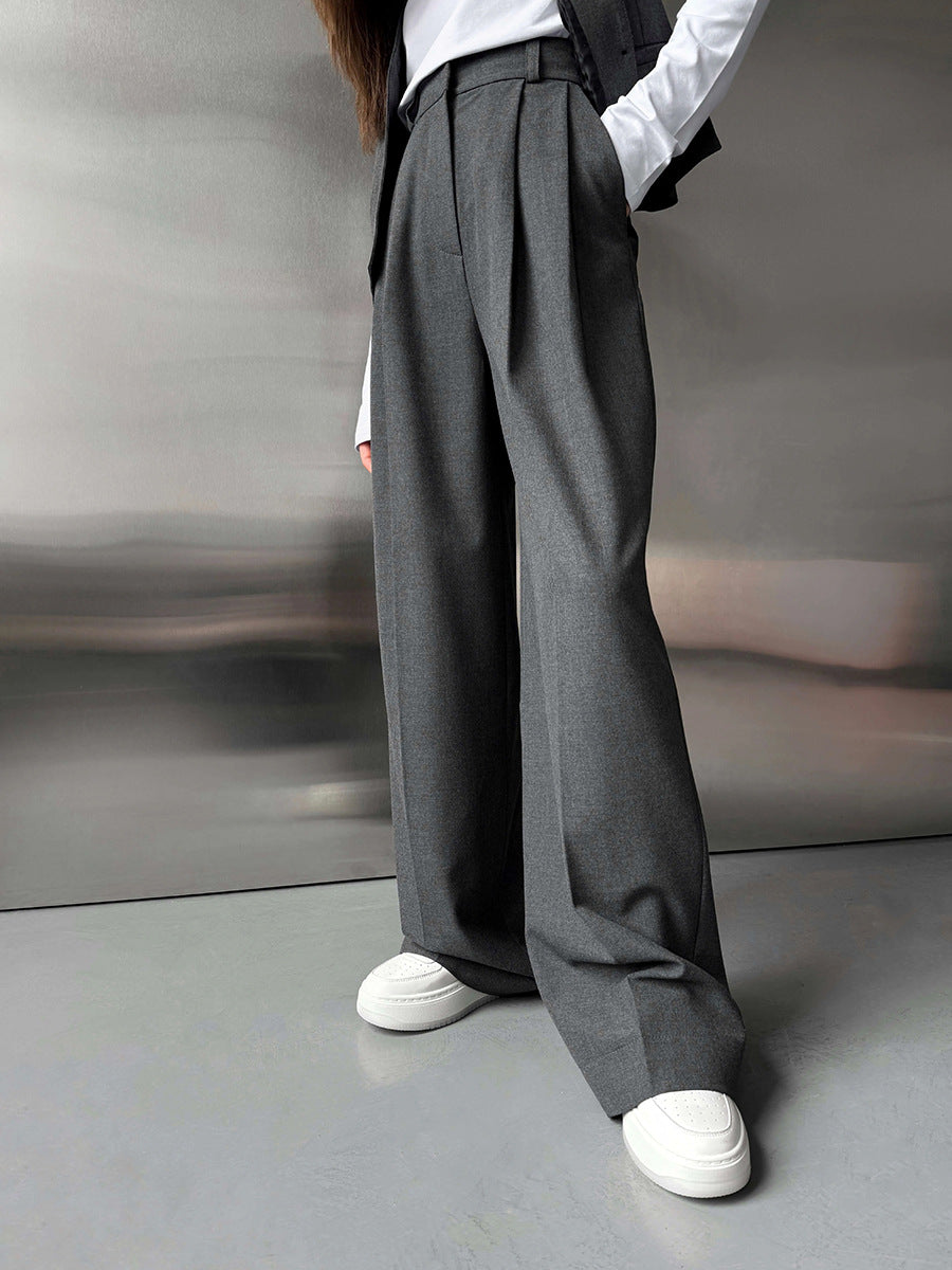 Pantalon de costume droit, ample et lisse