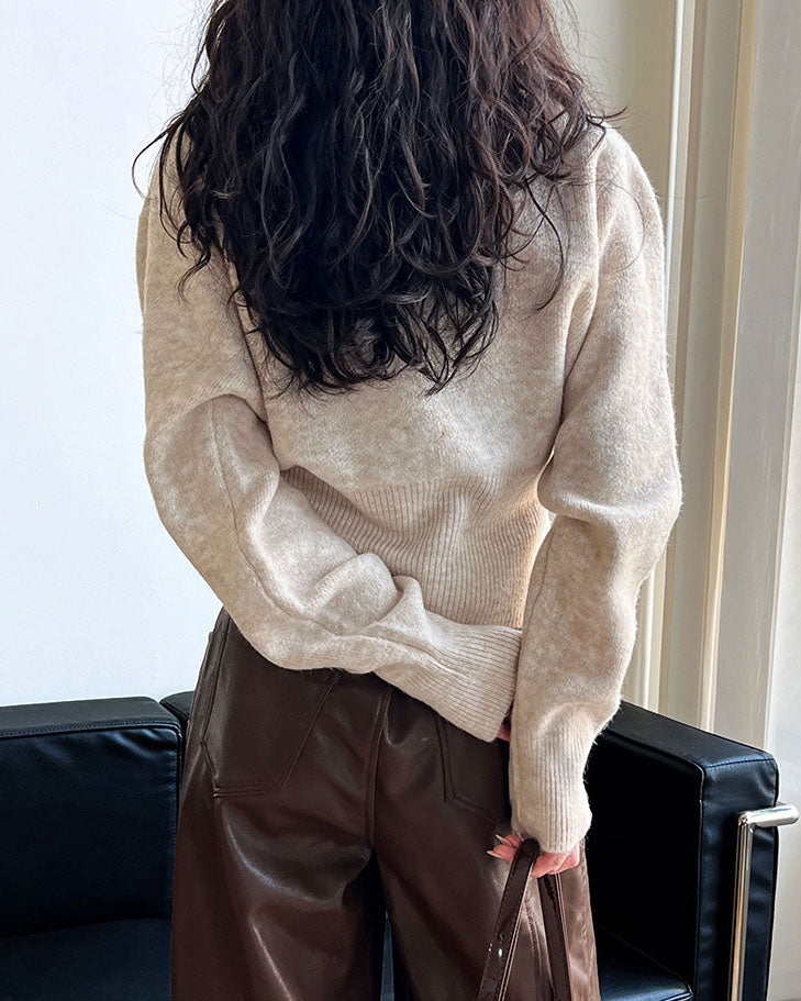 Pull zippé à col rond et taille cintrée