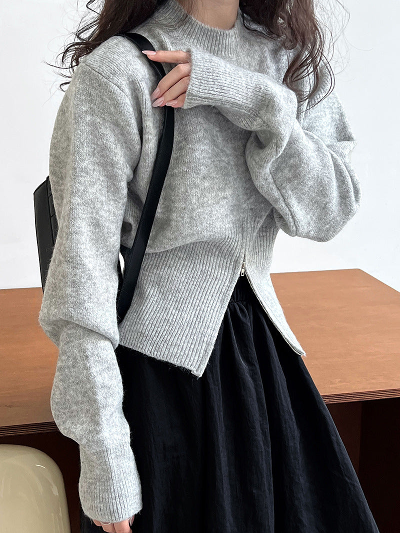 Pull zippé à col rond et taille cintrée