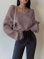 Off-the-shoulder cross-over asymmetrical cropped sweater