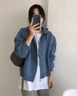 Sweat court ample à capuche en maille