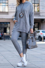 Ensemble deux pièces sweat-shirt à capuche avec poche kangourou de couleur unie et pantalon de survêtement slim