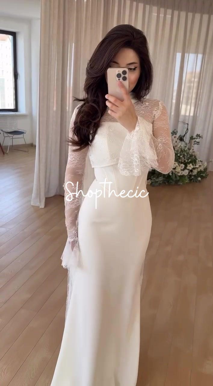 Abito in pizzo plissettato tettonico