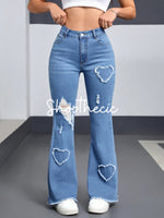 Heart-patterned ripped stretch flared jeans