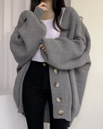 Cardigan tricoté à manches lanternes amples à simple boutonnage et col en V