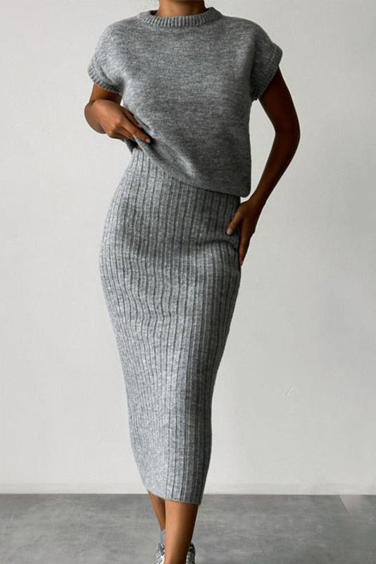 Sleeveless knitted pullover top and fitted long skirt two-piece set