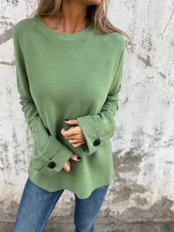 Blusa solta de cor sólida com mangas compridas e punhos abotoados