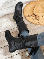 Bottines mi-mollet à bout rond et nœud arrière