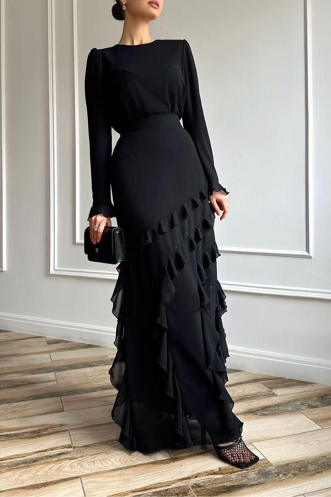Long-sleeved top with ruffled hem and fitted long skirt two-piece set