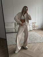 Zippered hooded sweatshirt and lace-up trousers two-piece set