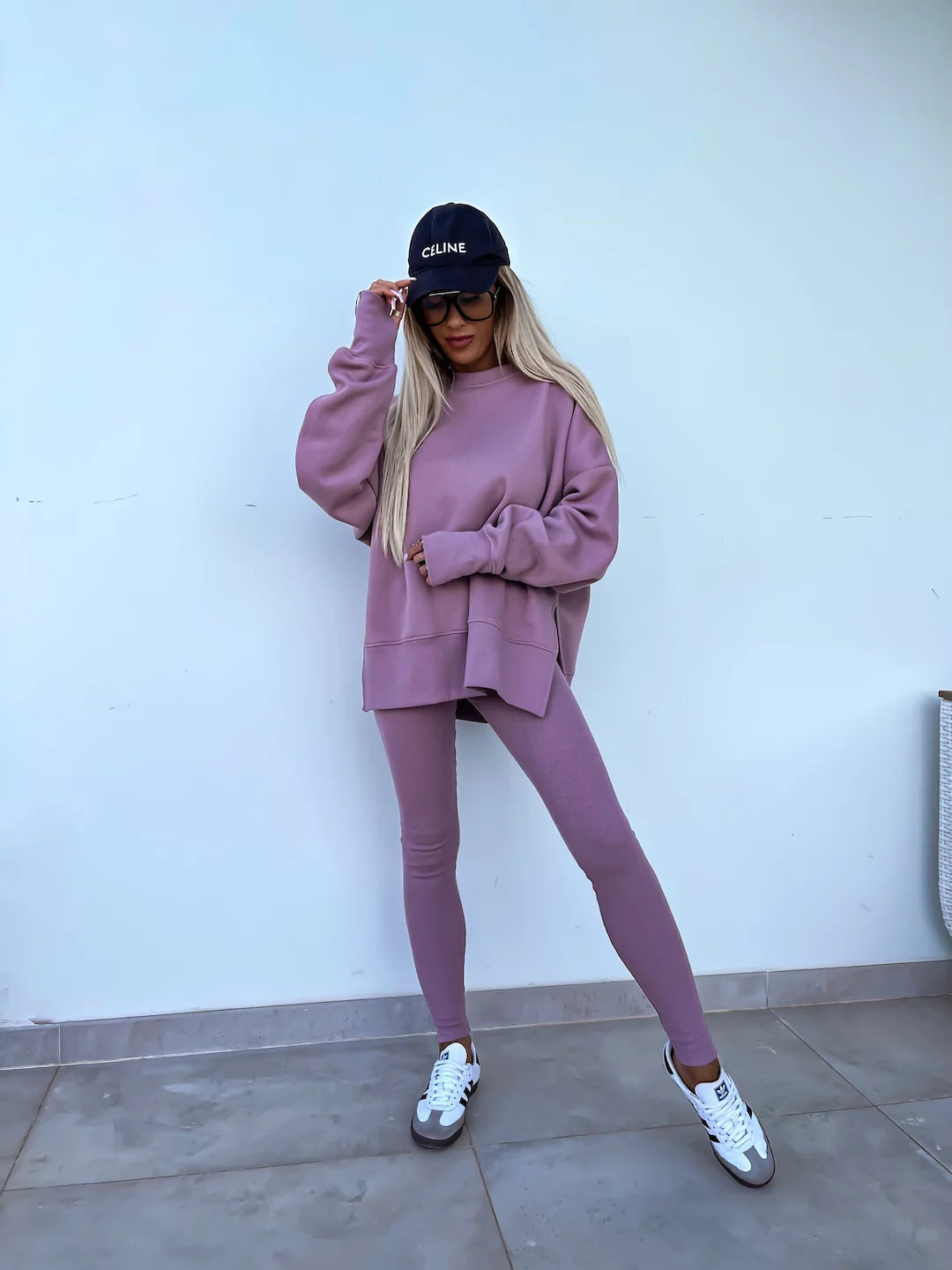 Loose long-sleeved round neck slit top and tight pants two-piece set