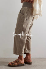 Washed drop-crotch mid-rise straight-leg harem cropped jeans