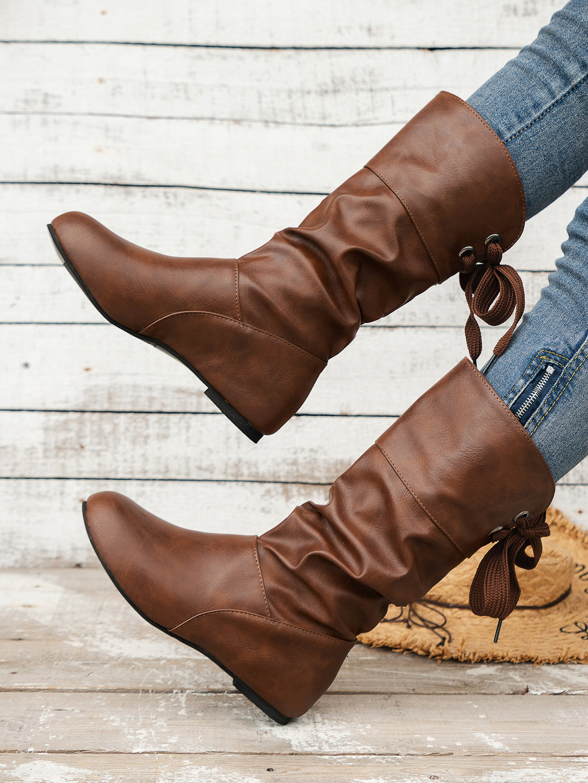 Bottines mi-mollet à bout rond et nœud arrière