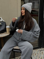 Anzug aus gestrickter Langarmjacke mit Reißverschluss und Hose mit weitem Bein