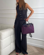 Bequemes Set aus ärmelloser Leinenweste und tief sitzender Hose