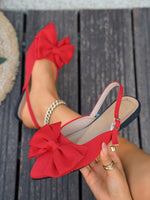 Large bow pointed toe flat heel sandals