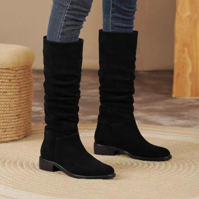 Bottes noires hautes en daim élégantes