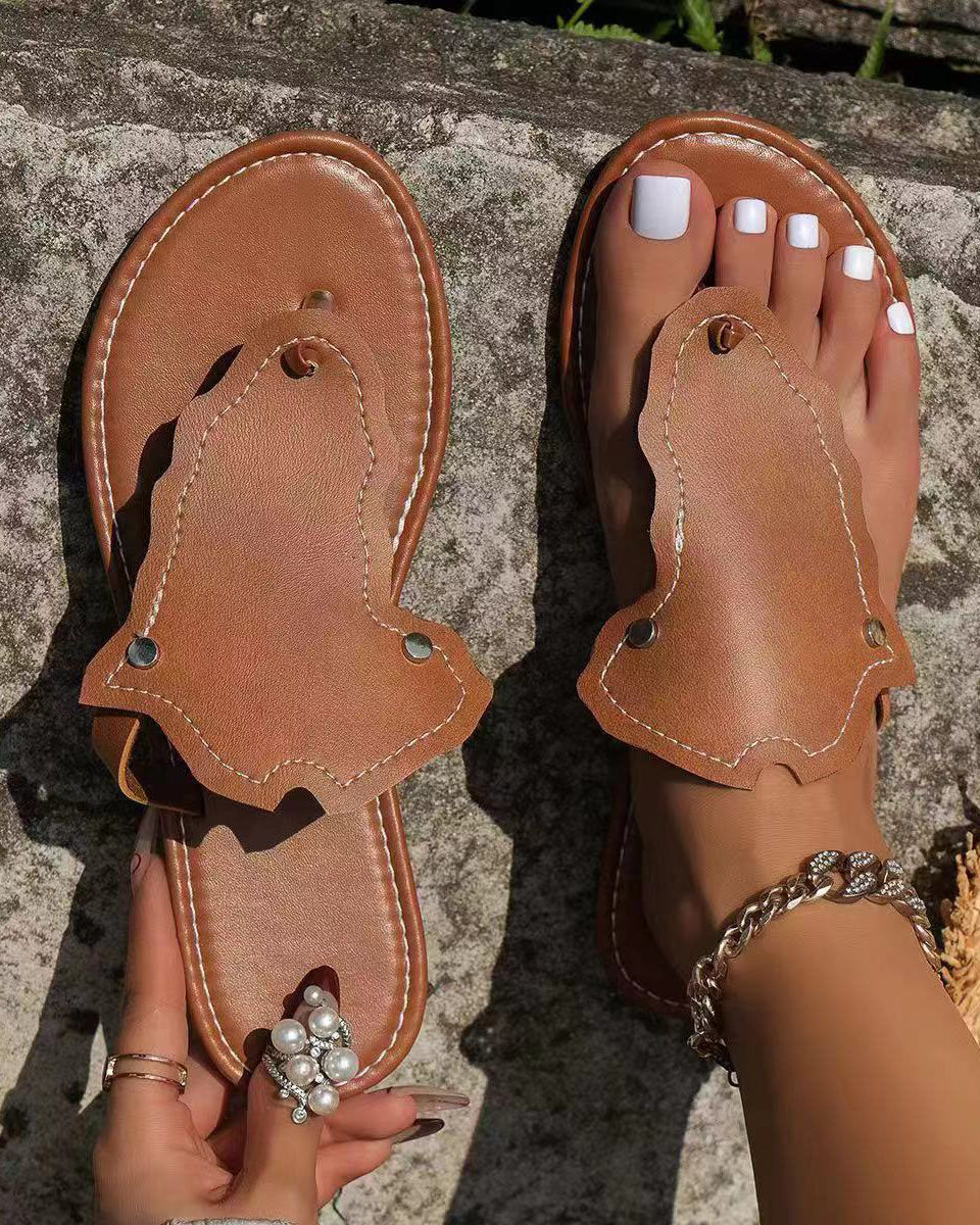 Pantoufles plates avec bracelet en cuir PU