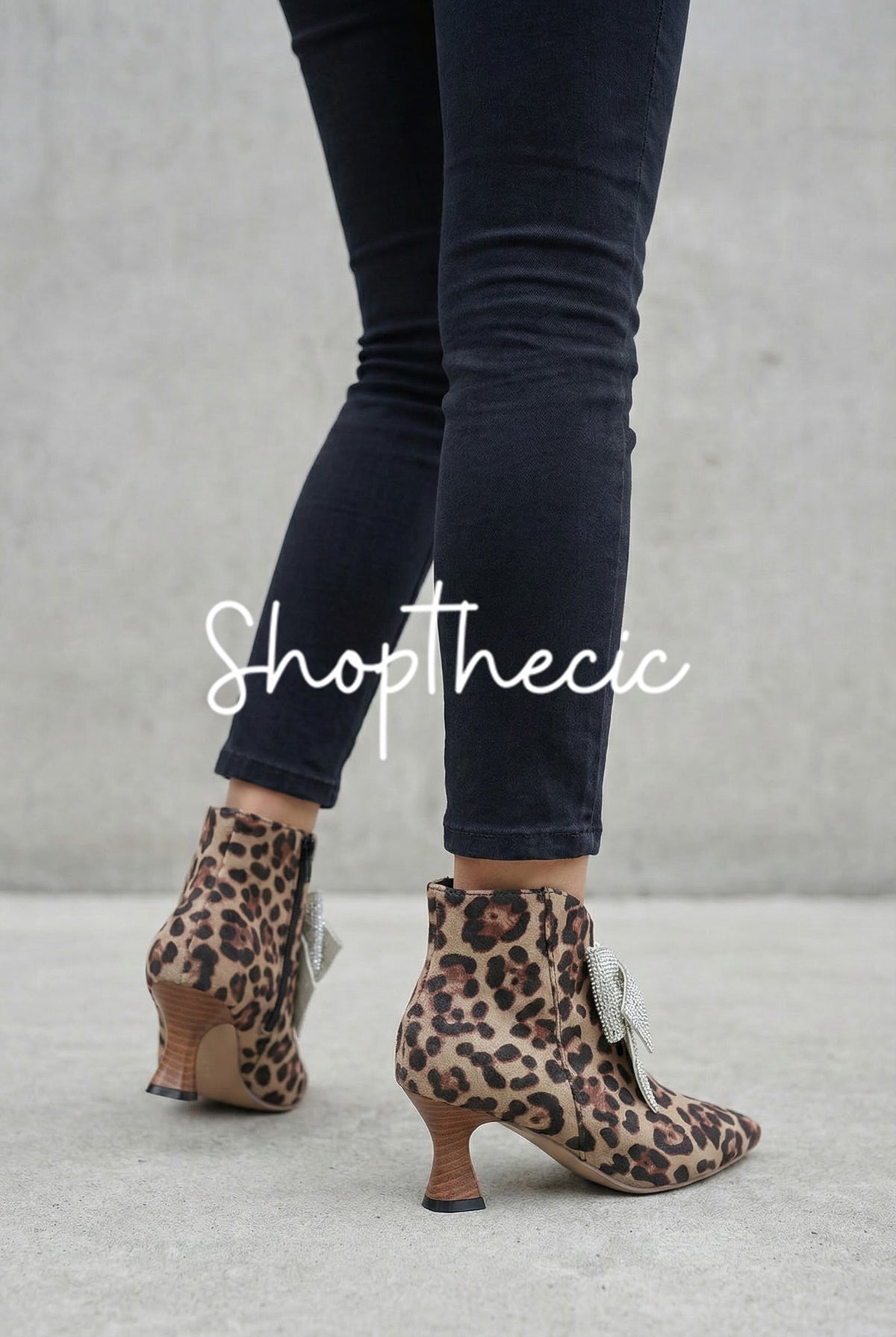 Bow-tie mid-heel pointed-toe Chelsea ankle boots