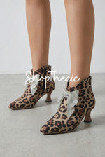 Bow-tie mid-heel pointed-toe Chelsea ankle boots