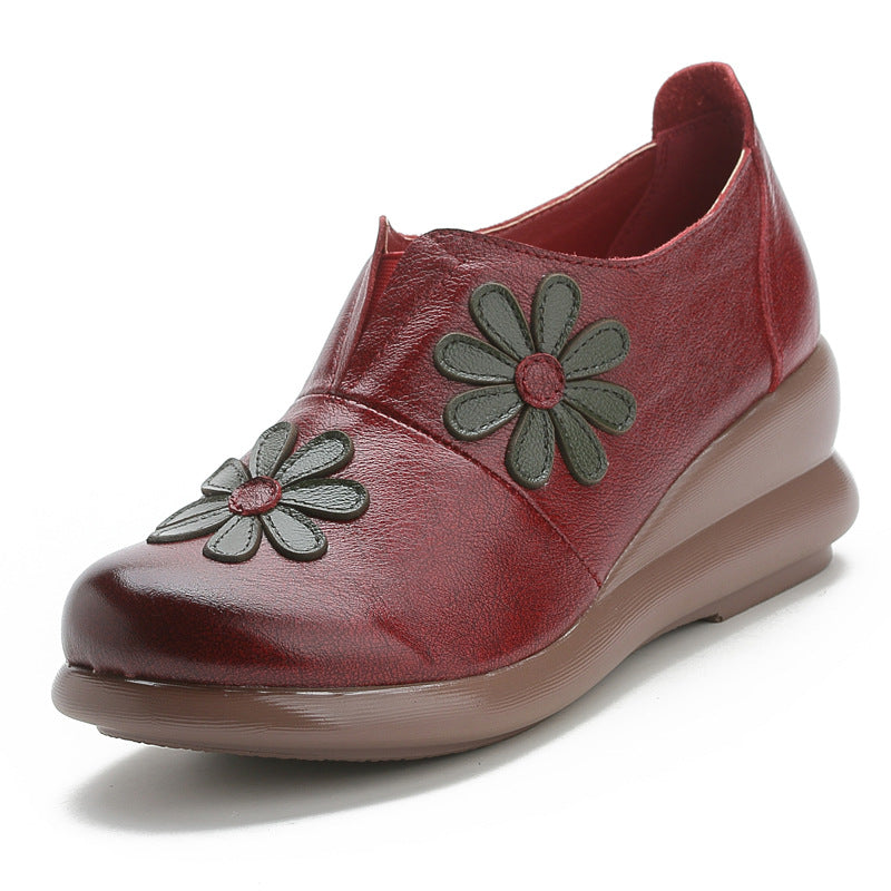 Mocassins compensés en cuir brodés de fleurs