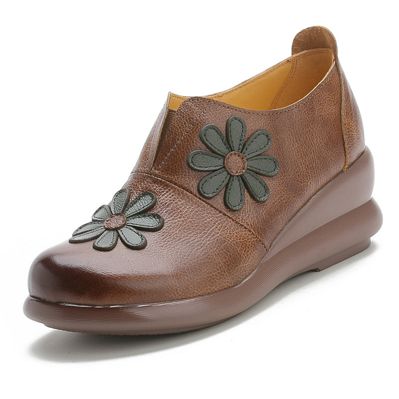 Mocassins compensés en cuir brodés de fleurs