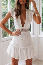 Rückenfreies, besticktes Spitzenkleid mit tiefem V-Ausschnitt