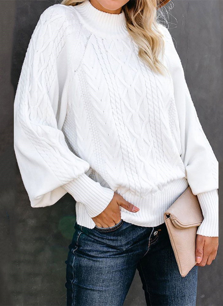 Pull en tricot torsadé à col mi-haut