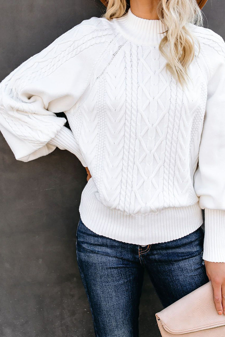 Pull en tricot torsadé à col mi-haut