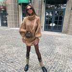 Robe pull moulante en tricot à col roulé et manches lanterne