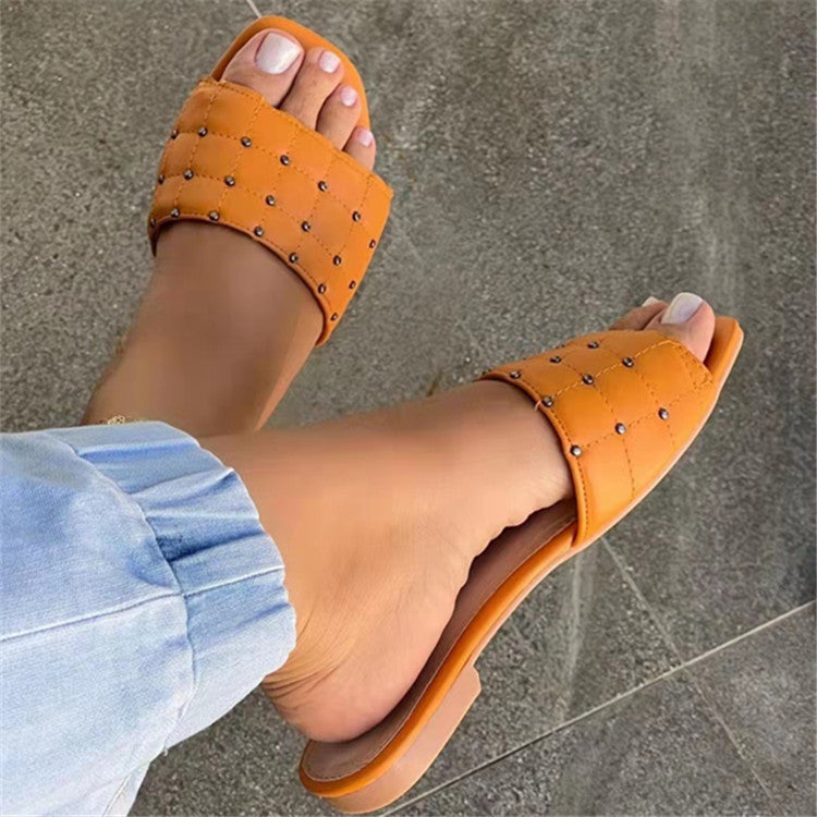 Nora Rivets Slip On Sandal