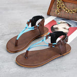 Flache Flip-Flop-Sandalen mit dreieckigem Riemen