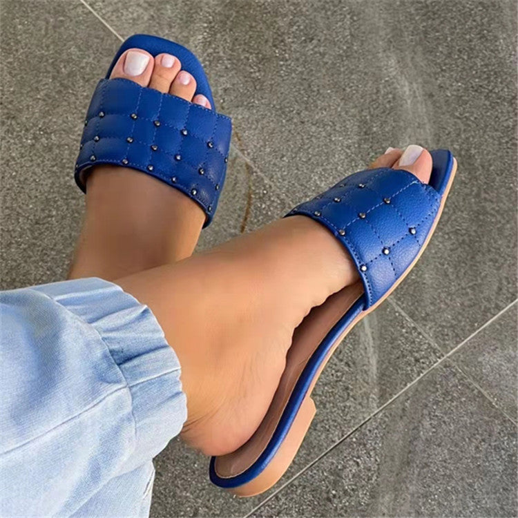 Nora Rivets Slip On Sandal