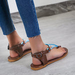 Flache Flip-Flop-Sandalen mit dreieckigem Riemen