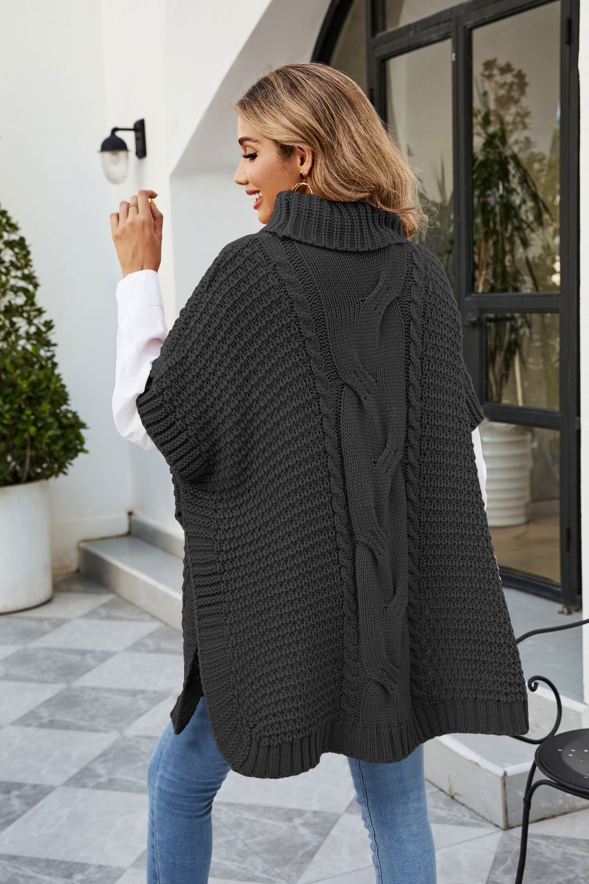Pull en tricot châle torsadé à col roulé